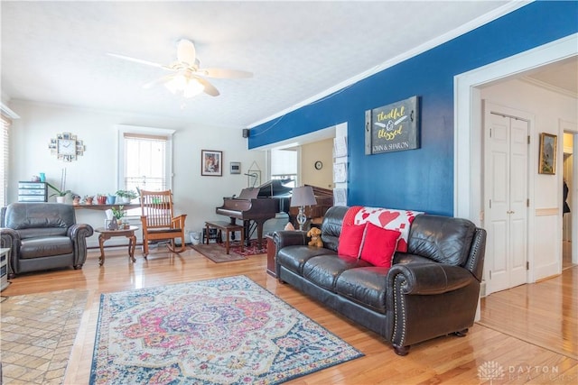 111 W Pinehurst St, Sidney, OH 45365 - living room featuring ornamental molding, ceiling fan, and wood finished floors