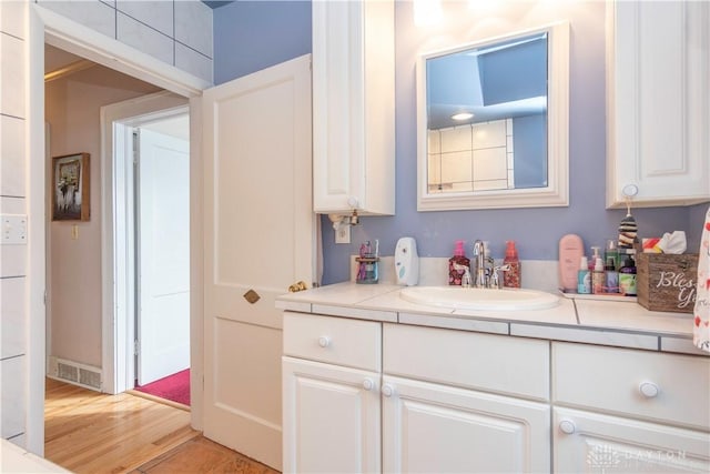 111 W Pinehurst St, Sidney, OH 45365 - interior space featuring visible vents, light wood-type flooring, and a sink