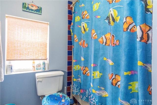 111 W Pinehurst St, Sidney, OH 45365 - bathroom with toilet and a shower with curtain
