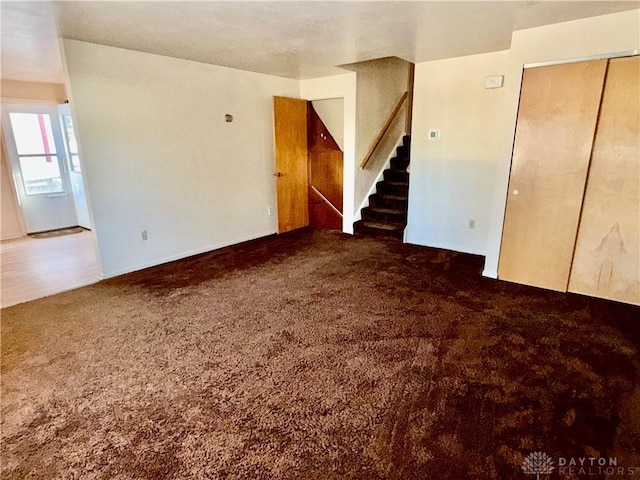 spare room featuring carpet flooring