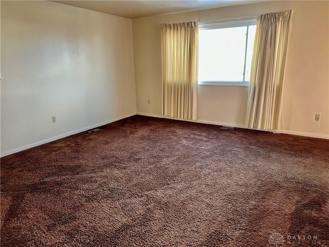 spare room with carpet floors