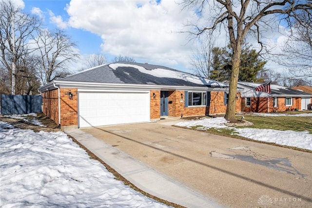 single story home featuring a garage