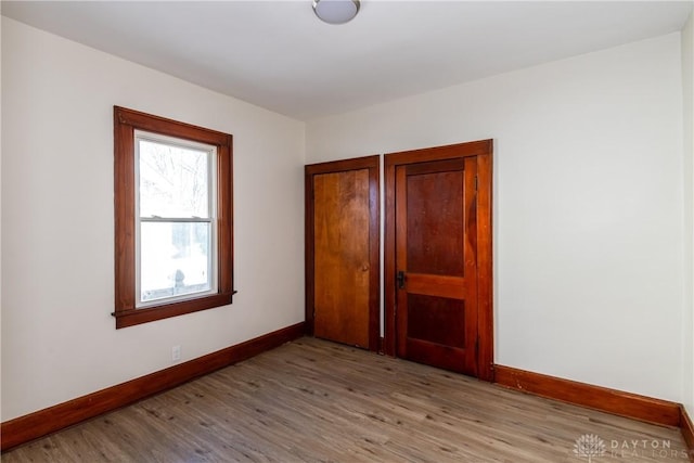 unfurnished bedroom featuring light hardwood / wood-style floors