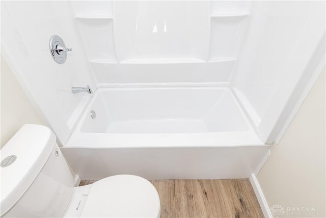 bathroom featuring toilet and hardwood / wood-style floors