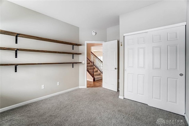 interior space with carpet flooring and a closet