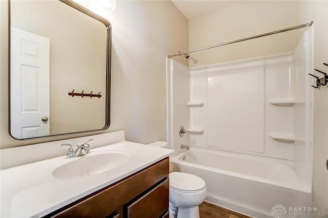 full bathroom with shower / washtub combination, vanity, and toilet