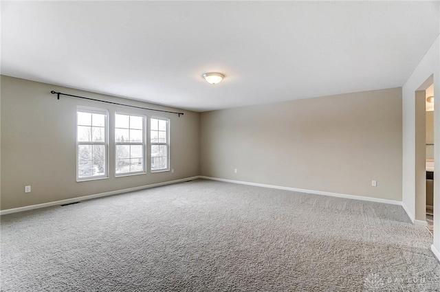 view of carpeted spare room