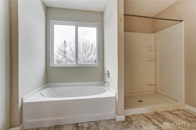 bathroom with a tub