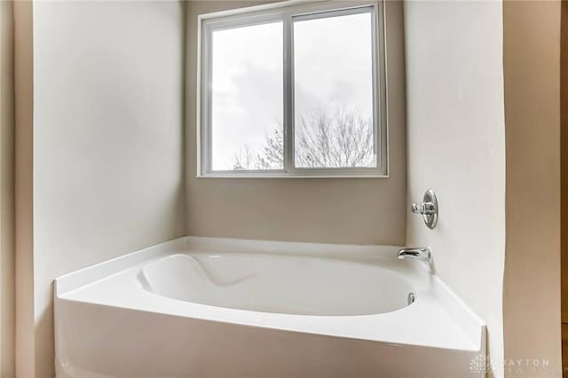 bathroom featuring a tub