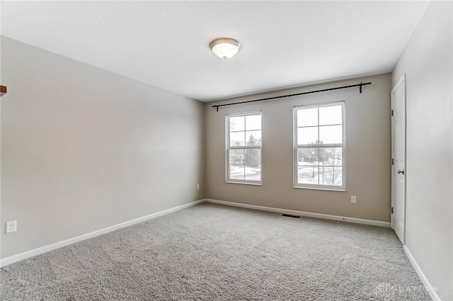 view of carpeted spare room