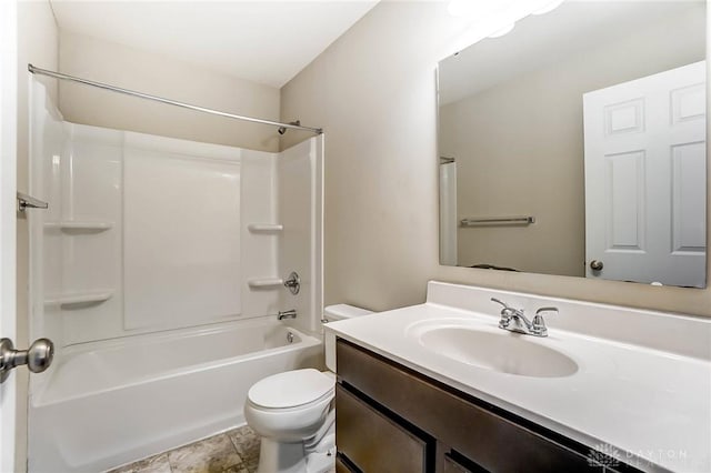 full bathroom featuring vanity, tub / shower combination, and toilet