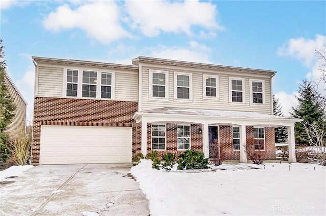 view of front of property featuring a garage