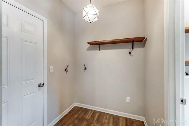 washroom with dark hardwood / wood-style flooring