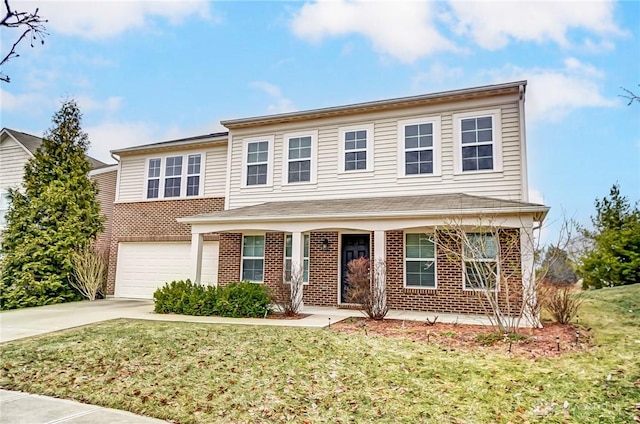 view of front of home featuring a garage and a front yard