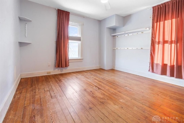 unfurnished room featuring hardwood / wood-style floors