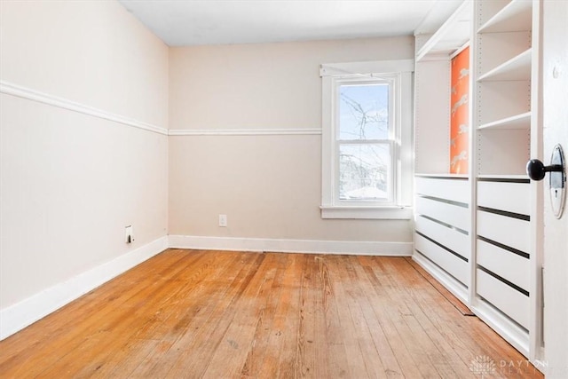 unfurnished room featuring light hardwood / wood-style flooring