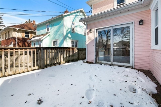 view of snow covered house