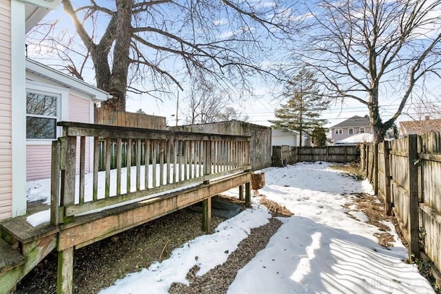 view of snow covered deck