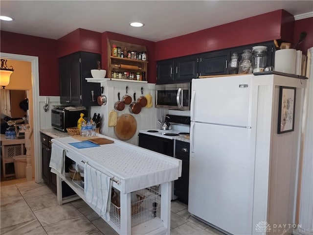 kitchen featuring white fridge