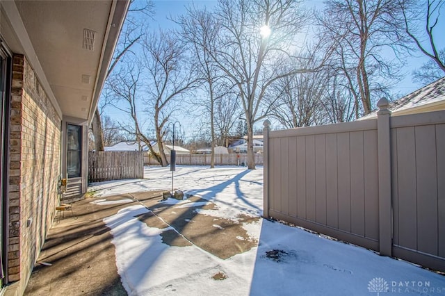 view of snowy yard