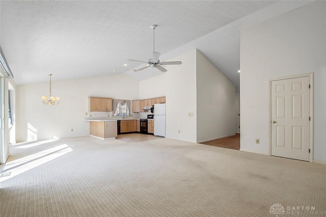 unfurnished living room with high vaulted ceiling, ceiling fan with notable chandelier, light colored carpet, and a textured ceiling