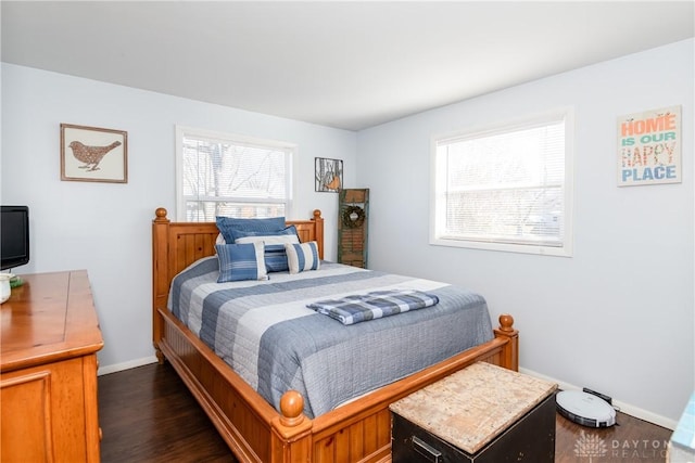 bedroom featuring dark wood-type flooring