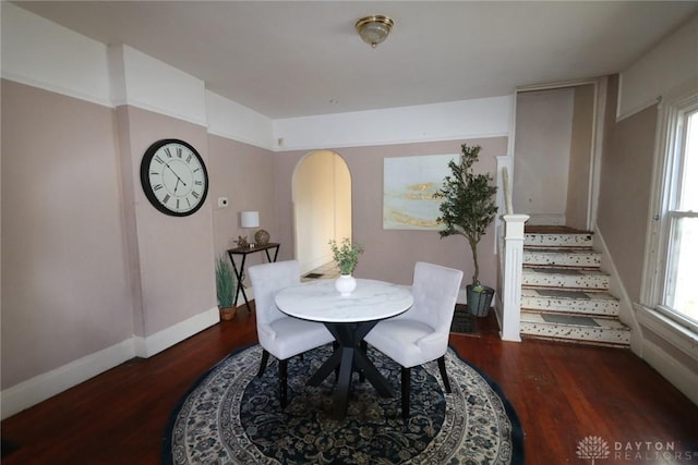 2318 Home Ave Unit 2316, Dayton, OH 45417 - dining room featuring wood finished floors, stairs, and arched walkways