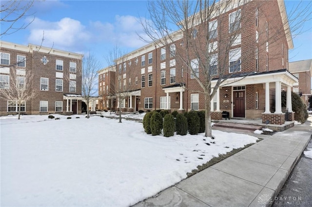 view of snow covered building