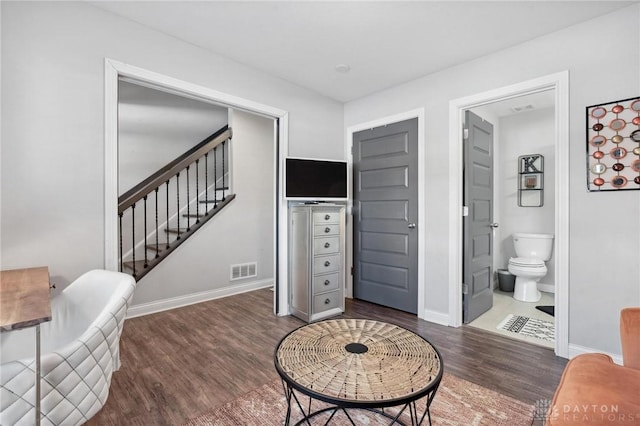 interior space with dark hardwood / wood-style floors