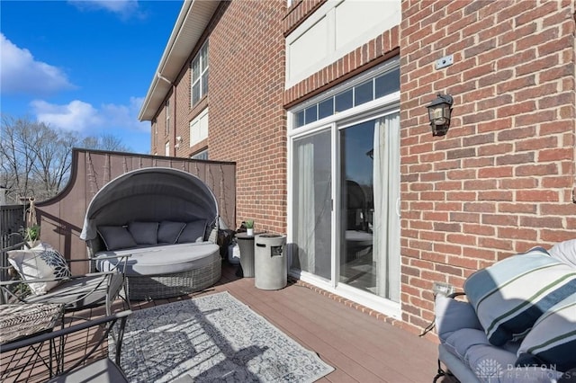 wooden deck featuring an outdoor living space