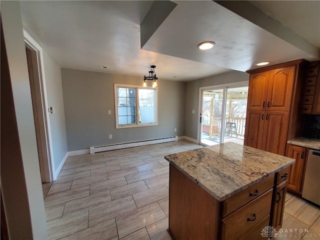 kitchen with light stone counters, hanging light fixtures, baseboard heating, stainless steel dishwasher, and a kitchen island