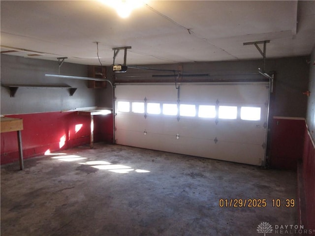 garage featuring a garage door opener