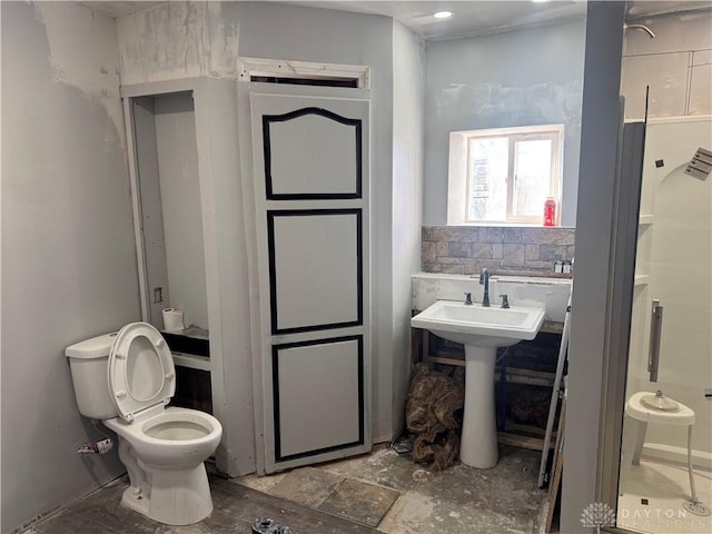 bathroom with sink and toilet