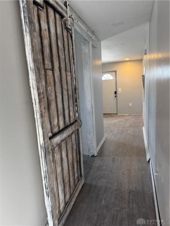 hallway featuring dark wood-type flooring