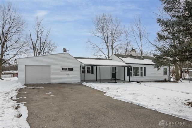 single story home with a garage