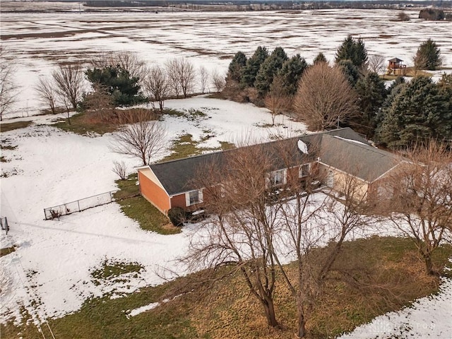 snowy aerial view with a rural view