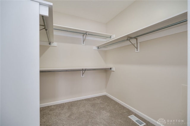 walk in closet with carpet flooring and visible vents