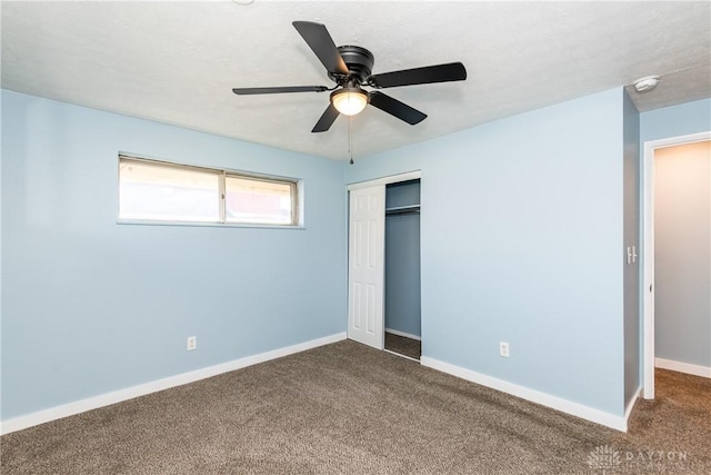 unfurnished bedroom featuring ceiling fan, carpet floors, and a closet