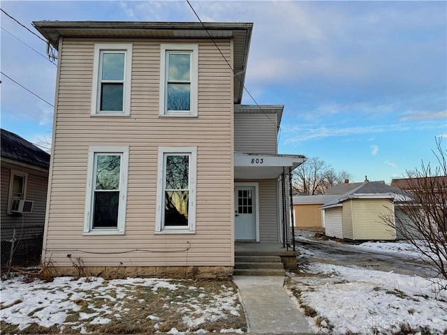 view of front of home featuring cooling unit