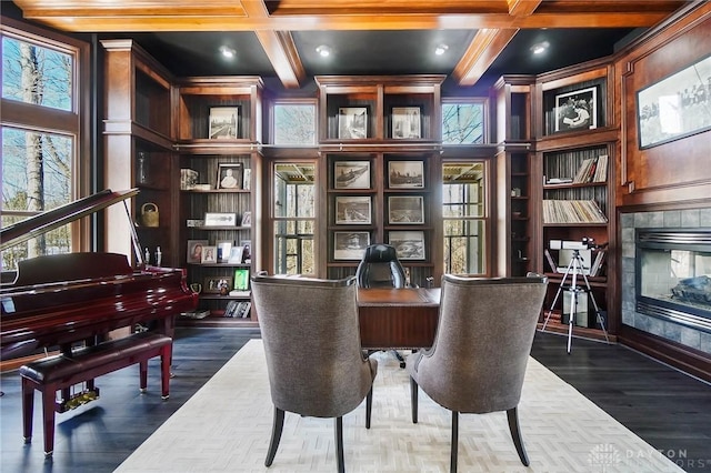 interior space featuring a fireplace, dark wood-type flooring, beam ceiling, and coffered ceiling