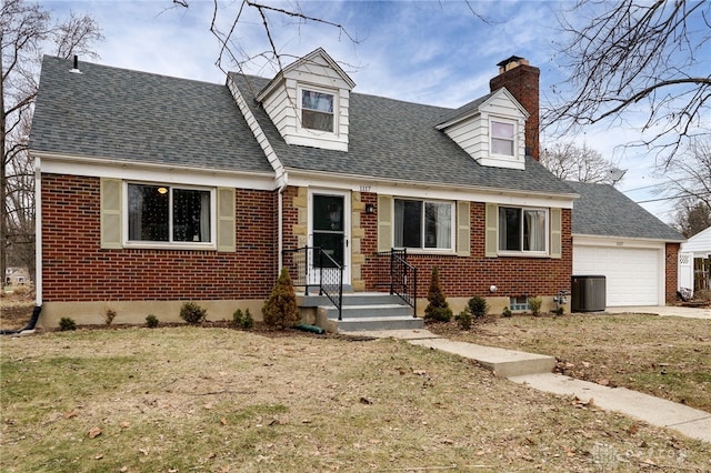 cape cod house featuring central AC unit, a garage, and a front yard