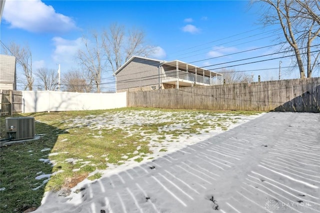 view of yard with central AC