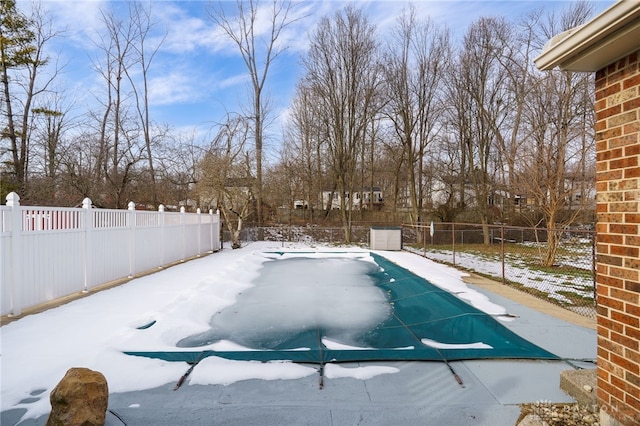 view of snow covered pool