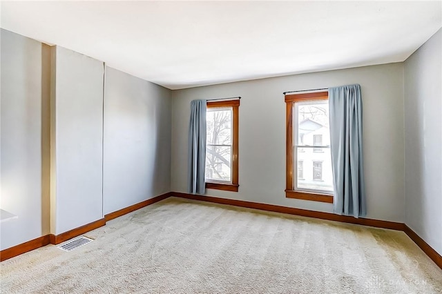 empty room with carpet flooring