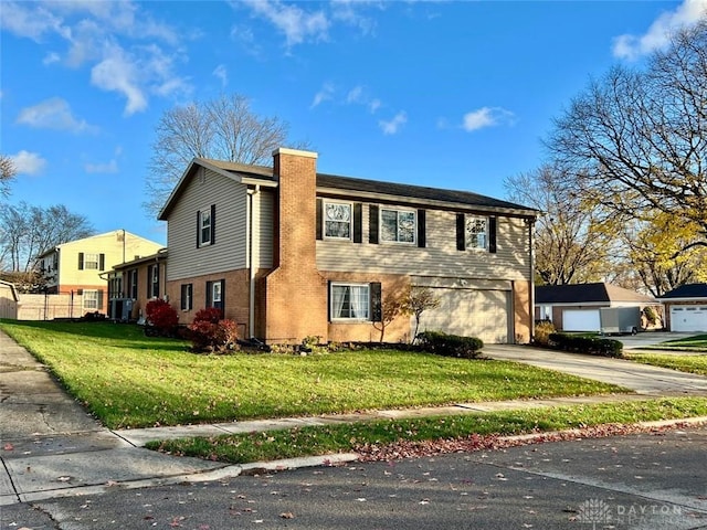 view of front of property featuring cooling unit, a garage, and a front lawn