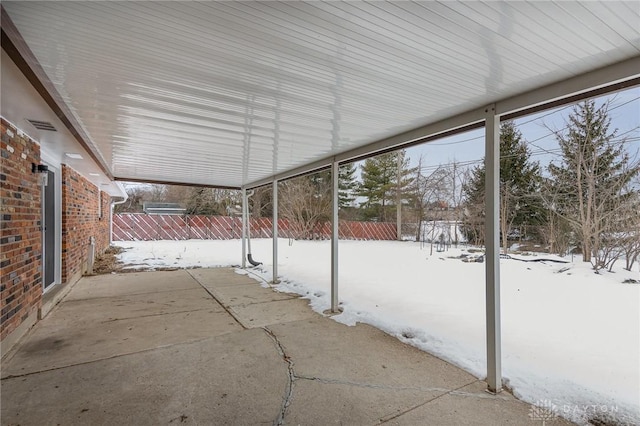 view of snow covered patio