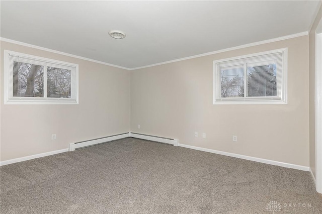 unfurnished room with a baseboard radiator, ornamental molding, carpet, and plenty of natural light