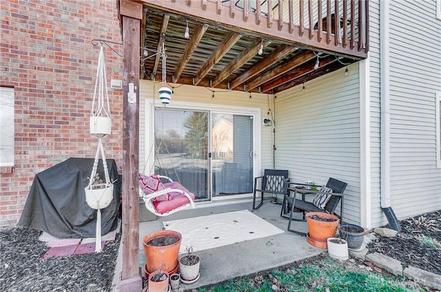 view of patio featuring a grill