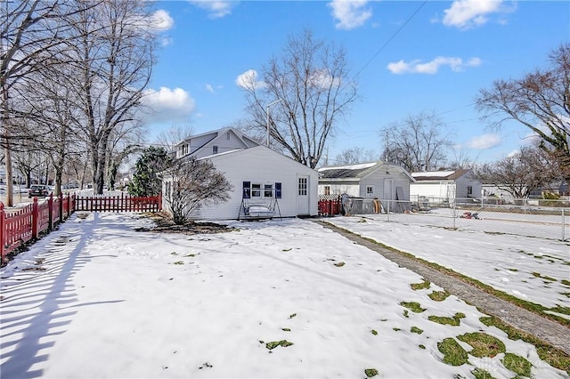 view of snow covered house