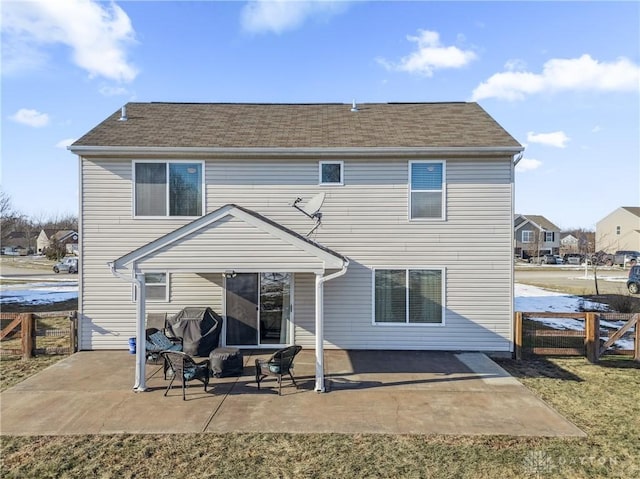 back of property featuring a patio area